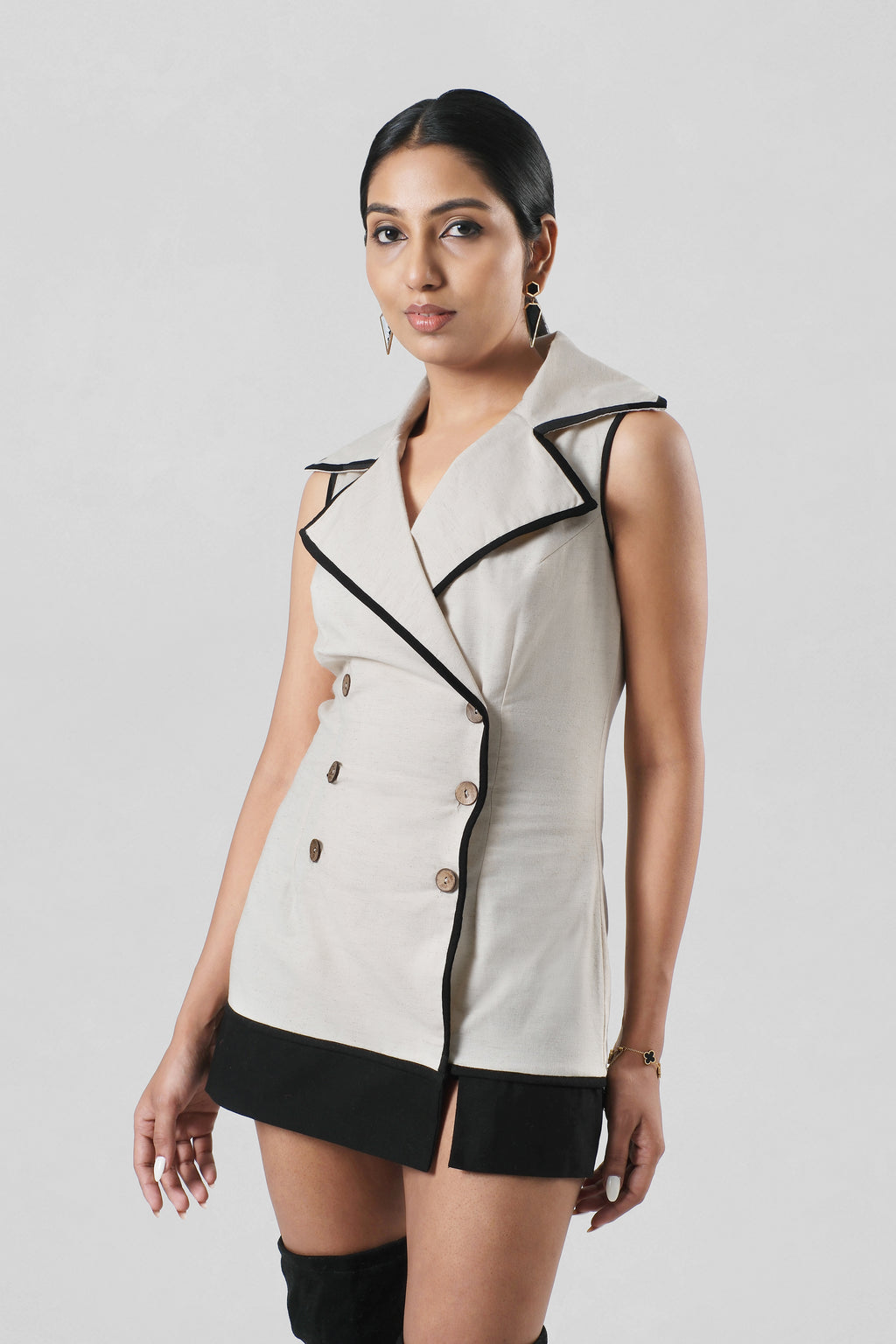 Front view of the Amelia Dress crafted from breathable linen and cotton canvas featuring a tailored sleeveless silhouette.