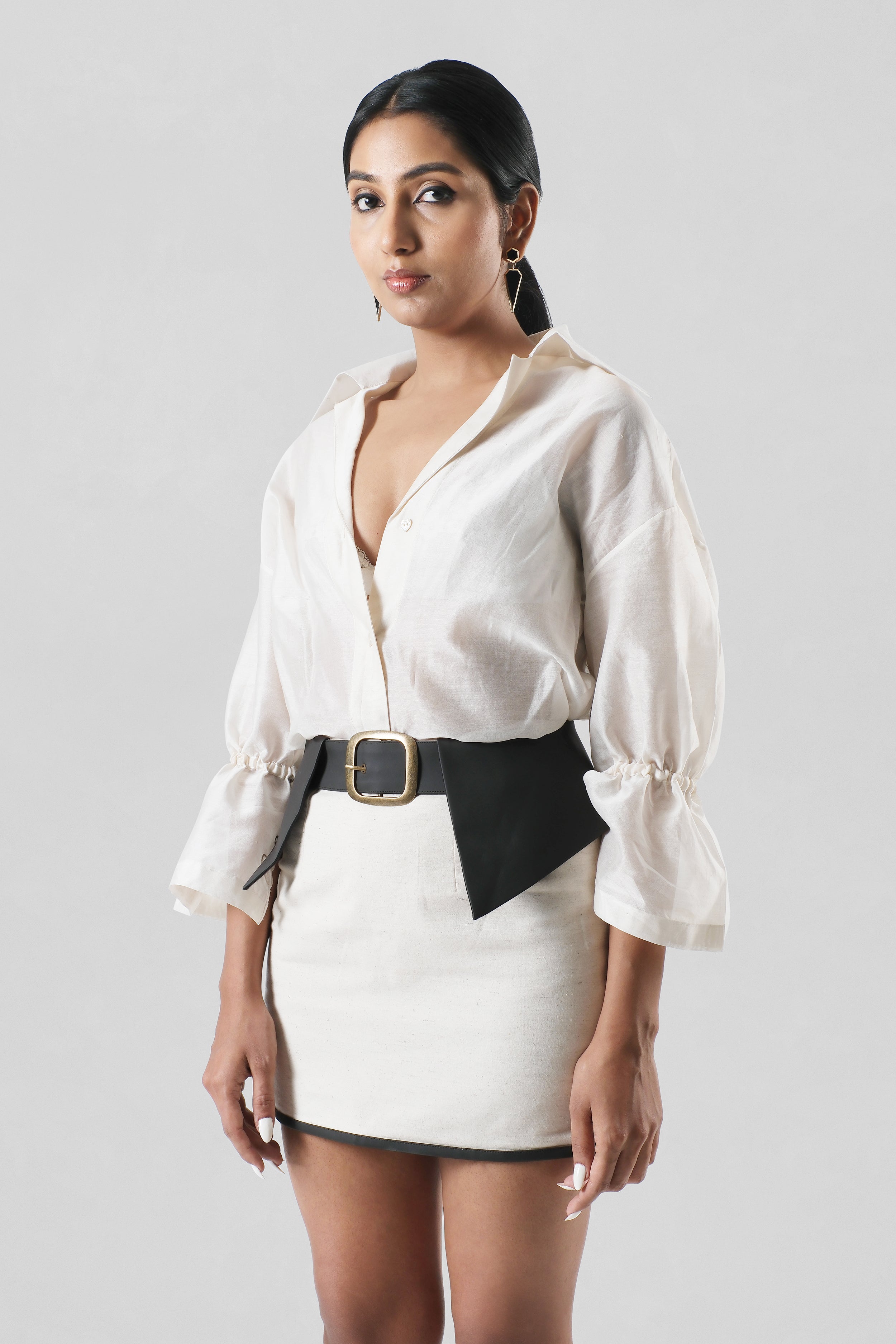 Front view of the Cleo Skirt featuring breathable linen with handcrafted cactus leather detailing, paired with the Virginia Shirt by House of Lore.