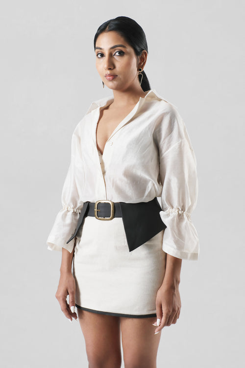 Front view of the Cleo Skirt featuring breathable linen with handcrafted cactus leather detailing, paired with the Virginia Shirt by House of Lore.