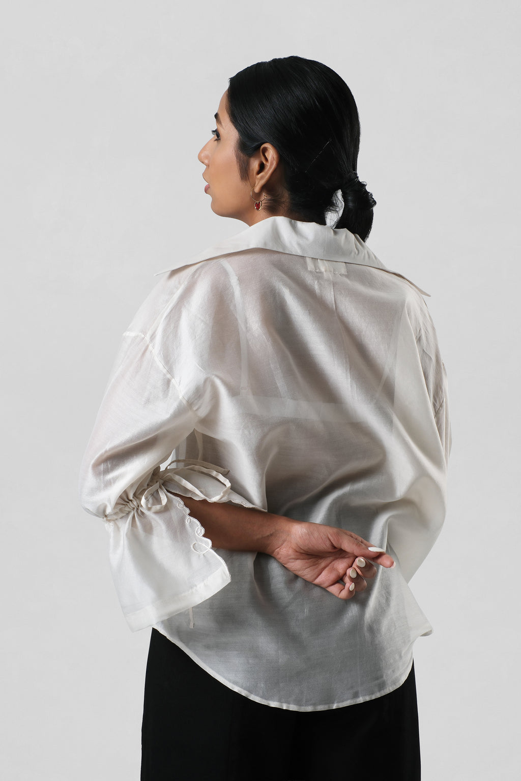 Back view of the Virginia Shirt showing the clean silhouette and elegant handcrafted finish.