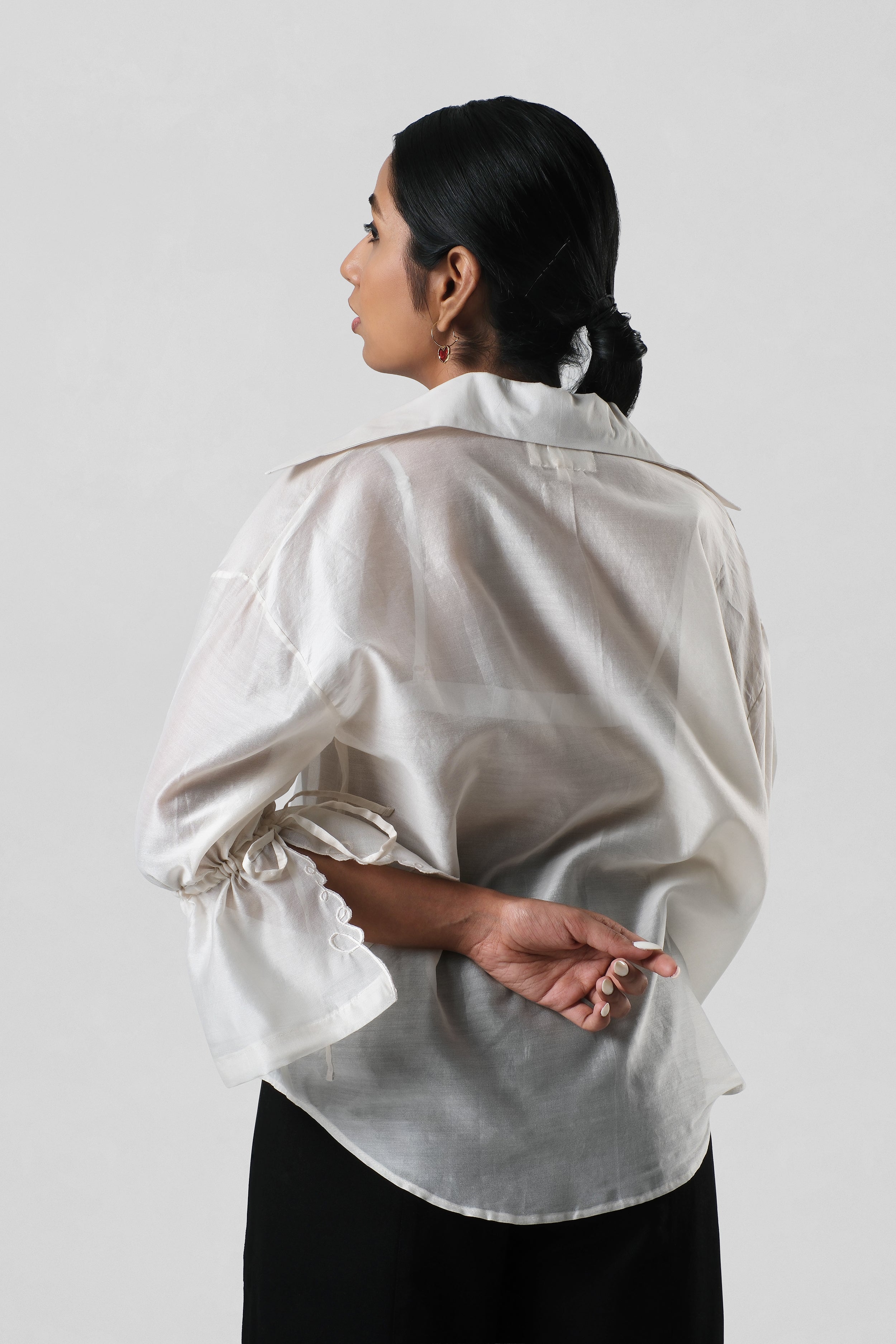 Back view of the Virginia Shirt showing the clean silhouette and elegant handcrafted finish.