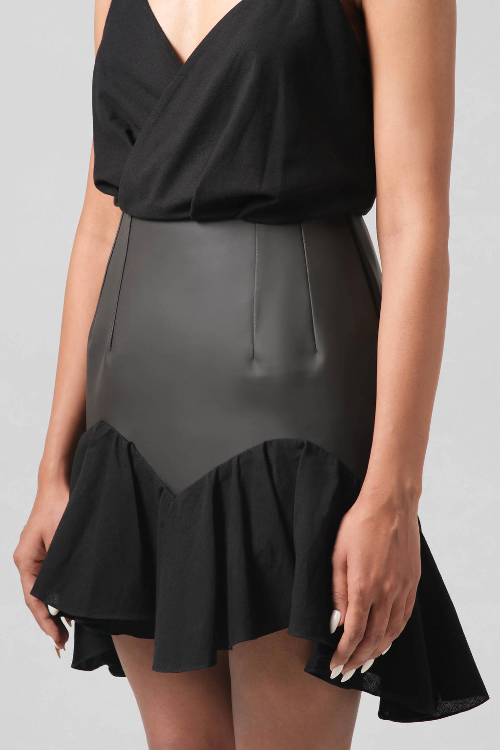 Close-up of the Vivienne Dress showcasing the softly gathered linen skirt and fluid handcrafted silhouette.
