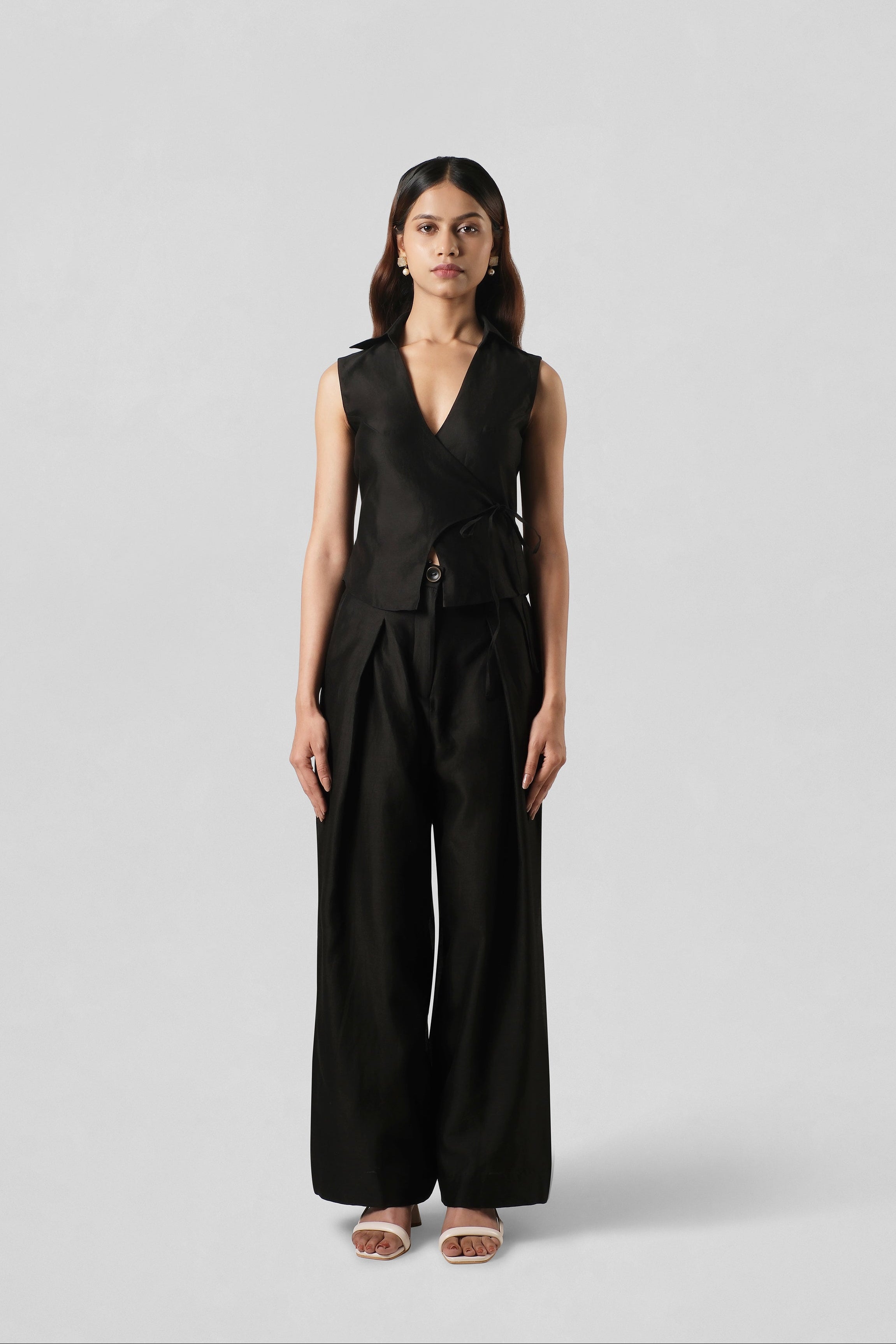 Front view of the Mira Black Chanderi Co-ord Set by House of Lore featuring a sleeveless wrap top paired with fluid wide-leg trousers.