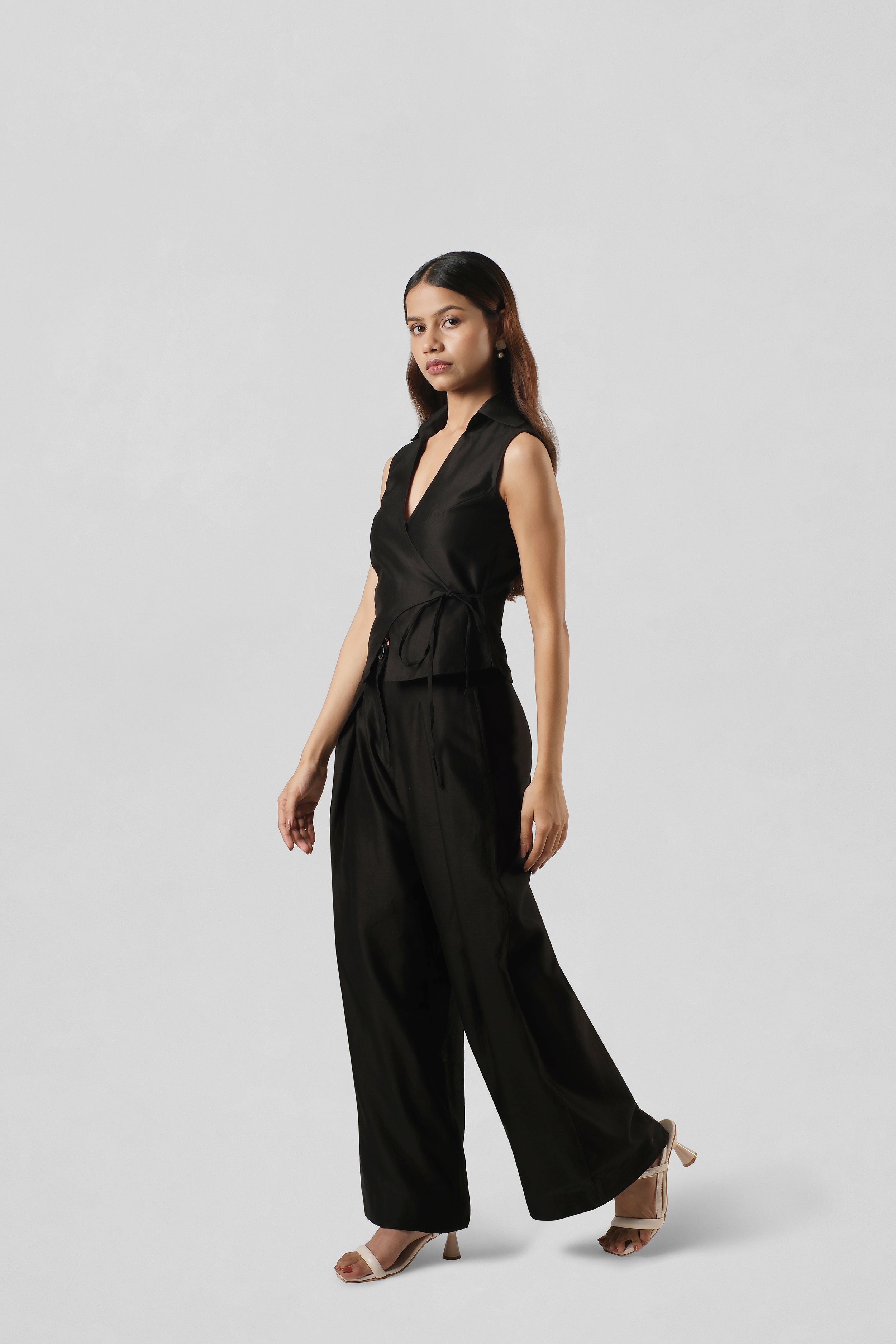 Full-length view of the Mira Black Co-ord crafted in lightweight Chanderi with an elegant wrap silhouette and relaxed tailored trousers.