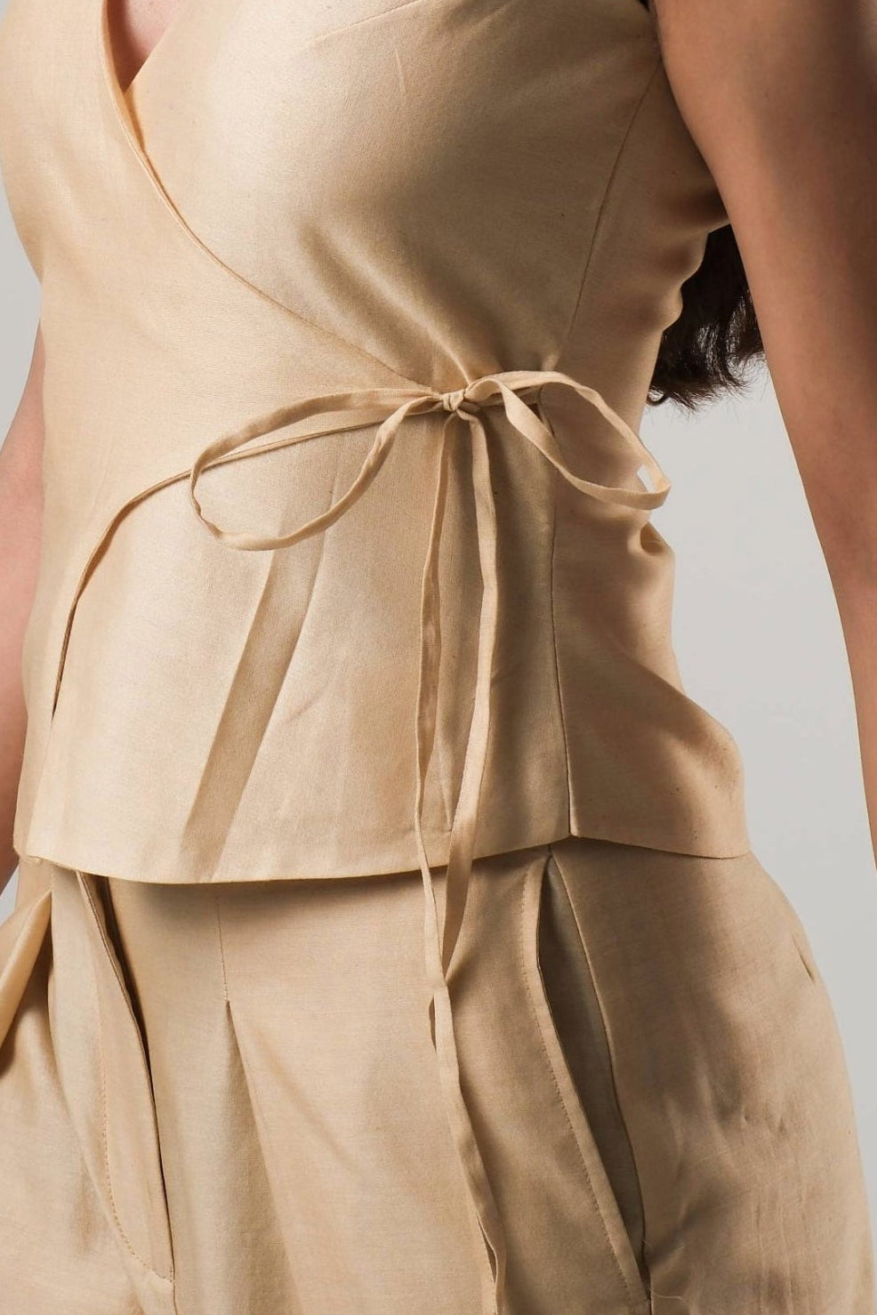 Back view of the Mira Gold Chanderi co-ord set showing the clean tailored silhouette and fluid drape.