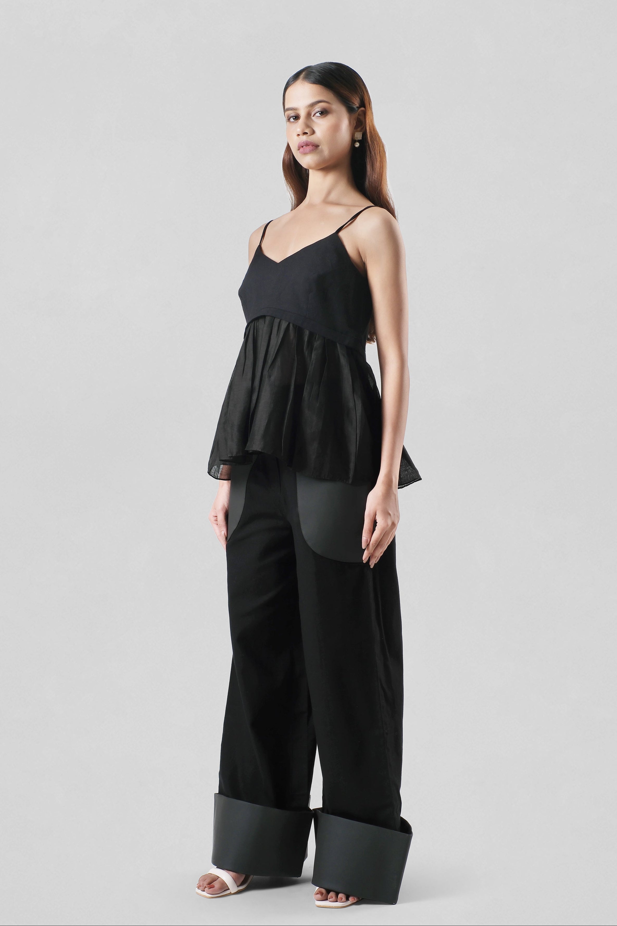 Serena Black Peplum Top in Linen and Chanderi by House of Lore worn with black wide-leg trousers